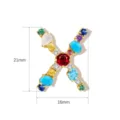 Close-up detail of the colorful crystal letter X pendant, showing size dimensions and stone setting. - Letter X / 21mm x 16mm
