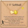 Gold softball and heart pendant necklace on display card for sports fans and players. - Gold Softball + Card