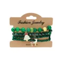 Christmas green beaded bracelet set with lovely elk and tree charms on card display. - Christmas Tree and Reindeer Green Beaded Bracelet (SGCZ-25814-LVS)