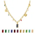Gold multi-charm birthstone necklace with interchangeable rectangular crystal pendant options. - March Birthstone