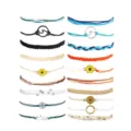 Boho braided string bracelets set with wave, sunflower, and mountain charms for women. - Style 5