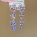 Elegante paarse kristalen bloem lange kwast oorbellen voor vrouwen mode sieraden gift. - Stijl 8 / Roze
