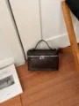 Dark brown woven vanity bag with top handle and silver zipper, elegant daily shoulder handbag. - No Pendant / Coffee