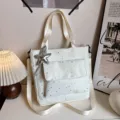 White star pattern canvas tote bag, large capacity shoulder bag with front pocket and pendant. - Star Print Style (With Pendant) / White