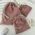 Dreiteiliges Set aus rosa Kord-Aufbewahrungsbeuteln mit Kordelzug für Kosmetik - Klein (14x16) / Fleischrosa