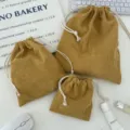 Mustard yellow corduroy drawstring makeup bag set of three in three handy sizes - Small (14*16cm) / Turmeric