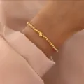 Gold heart bead bracelet for women, minimalist stretchy beaded wrist jewelry daily wear. - Heart Charm Beaded Style (44) / Gold