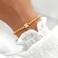 Gold bead stretch bracelet with clover charm, minimalist fashion jewelry for women elegant. - Clover Charm Beaded Style (46) / Gold