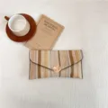 Woven striped envelope clutch bag, colorful straw fashion accessory for women variants. - Khaki