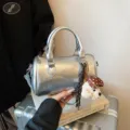 Silver metallic Boston handbag for women, stylish shoulder crossbody bag with cute dog pendant. - With Pendant / Silver