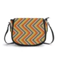 Ethnic style PU leather saddle bag with colorful chevron pattern and adjustable crossbody strap. - Colorful Wave Ethnic (V2MAB-010) / L 25 * W 19 * H 10.5