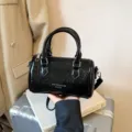 Trendy black patent leather cylinder handbag, retro barrel pillow crossbody bag for women. - No Pendant / Black