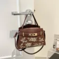 Brown women handbag variant with gold embroidery and metal lock, elegant crossbody shoulder bag. - Brown