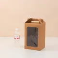 Detail of brown kraft paper gift bag with handle and clear window for scale reference. - 25*18*13 / Kraft Color