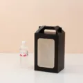 Elegant black cardboard gift box with handle and clear window for doll packaging - Black