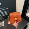 Orange crocodile pattern mini crossbody bag, stylish small lipstick bag with gold chain. - Brown