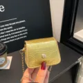 Golden metallic mini crossbody bag with crocodile texture, stylish fashion handbag for women. - Gold