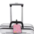 Cute pink cartoon pattern luggage tag attached to a silver travel suitcase handle display. - M / Pink Sweet Style (XLP-018)