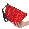 Red snowflake pattern PU leather clutch bag with black wrist strap for women cosmetic use. - Red Background White Snowflake Print (hzb-048) / 21.5x14.5x6.5cm