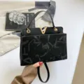 Black fashion leather shoulder bag, elegant top handle design for women daily commuting use. - Black