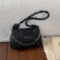 Black PU leather underarm shoulder bag with star pattern, trendy chain and braided strap. - Black