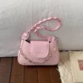Chic pink underarm shoulder bag with braided handle, metal chain and star details for women. - Pink