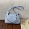 Light blue stylish women shoulder bag with star pattern and chain strap for daily commute. - Blue