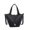 Sac seau en cuir noir pour femme, élégant sac à main avec cadenas et poignée. - Noir