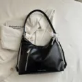Stylish black PU leather hobo shoulder tote bag with front zipper pocket pearl bow. - Black