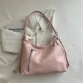Stylish pink PU leather women underarm shoulder bag and backpack with chic pearl bow. - Pink
