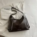 Dark brown PU leather shoulder bag for women, commuter hobo tote bag with zipper and pearl bow. - Brown