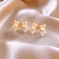 Eleganti orecchini a perno con fiocco placcato oro e smalto bianco stile vintage. - 104# Oro Bianco Fiocco