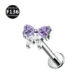 Dettaglio piercing labret fiocco in titanio con zirconi viola a cuore e pietre chiare. - Solo testa (senza barra) / Viola + Bianco