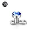 Detailed close-up view of titanium dermal anchor piercing with stunning blue gem crystal top. - Silver Blue