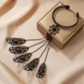 Gothic black spider web hand harness with filigree finger rings for Halloween costume - Black Spider Bracelet