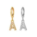 Stainless steel letter A huggie hoop earrings, available in gold and silver with cubic zirconia. - Style A / Silver