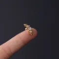Goldfarbener Edelstahl Knorpel Piercing Stecker mit klarem Kristall Cluster und Kugelverschluss. - 1.2x6mm / No. 5 Gold