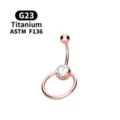 Detail view of G23 titanium belly button ring in rose gold with sparkling crystal gem. - 1.6x11mm Bar / Rose Gold