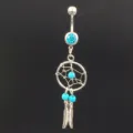 Close-up of a stylish navel piercing ring featuring a dreamcatcher motif with turquoise beads. - 1.6*11*5mm / Silver Blue