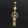 Gold tone navel ring featuring dreamcatcher design, white beads, and leaf charms for body jewelry. - 1.6*11*5mm / Gold White