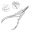 Stainless steel body piercing tool detail view, professional closing and opening ring pliers for jewelry. - Steel