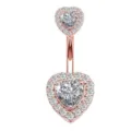 Close-up detail of rose gold double heart belly ring featuring sparkling clear zirconia stones. - 1.6x10mm / Tandem Double Heart Rose Gold
