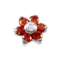 Detailed view of a flower dermal piercing top featuring red and clear cubic zirconia stones. - M0.9 Thread for 1.2mm Base / Red