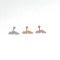 Close-up detail of three colored crystal cartilage earrings in silver, gold and rose gold. - NO 2 Style / Silver