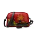 Vintage red leather crossbody bag featuring unique embossed lotus flower design for women - Red