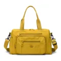 Borsa a tracolla da donna in nylon giallo con tasche multiple, stile casual ed elegante. - Giallo