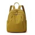 Yellow nylon casual backpack for women, stylish daily travel school bag with multi pockets. - Honey Yellow