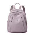 Casual purple nylon backpack for women, lightweight travel daypack with multiple zipper pockets. - Lilac Purple