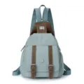 Petit sac a dos mini convertible pour femme en bleu clair avec des details en cuir marron. - Bleu