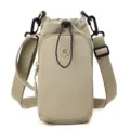 Minimalist nylon crossbody bag with drawstring closure and front zip pocket, casual khaki design. - Mocha